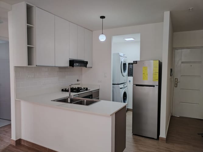 Open plan living room with kitchen counter PH Velure El Cangrejo Panama