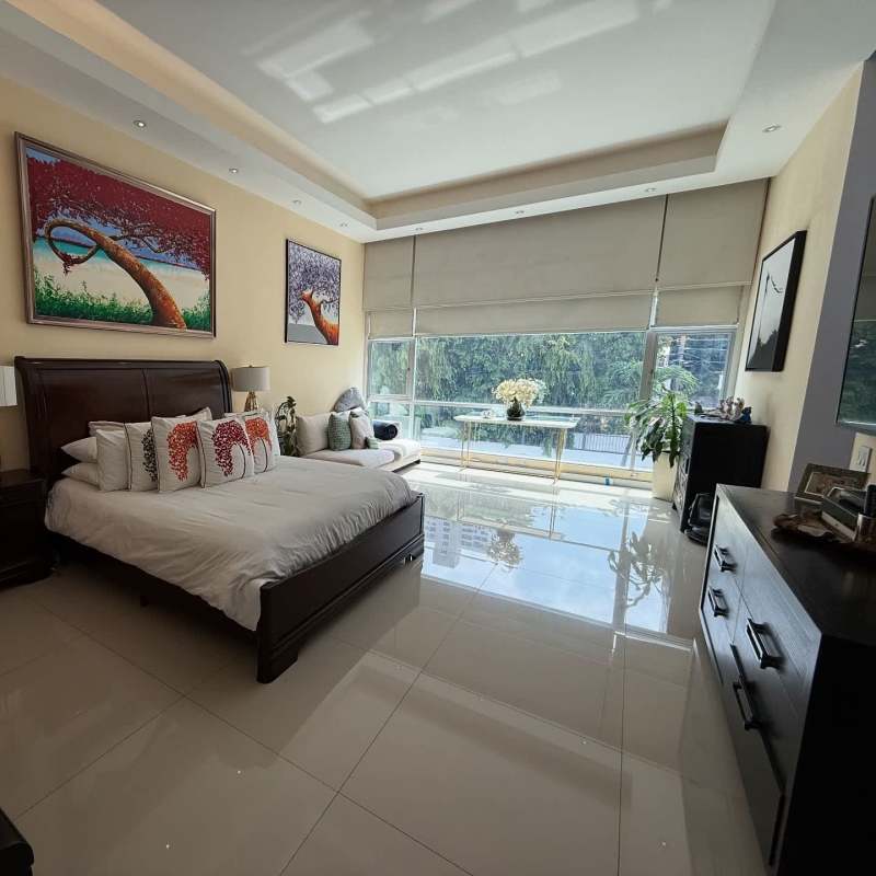 Modern kitchen with granite island and high-end finishes Bianco Loft Panama City