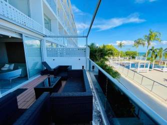 Dining area connected to living room fully furnished with ocean view from terrace PH The Palms
