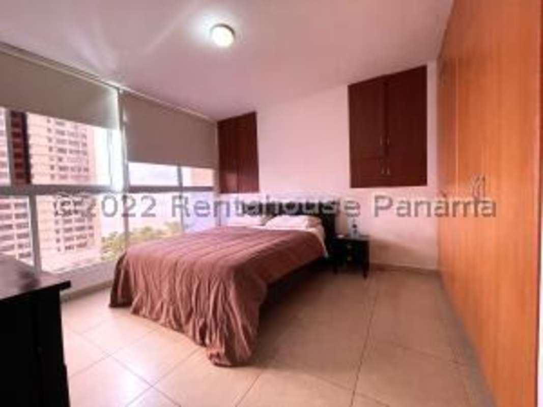 Modern bright living room with balcony access overlooking Pacific Ocean Panama City