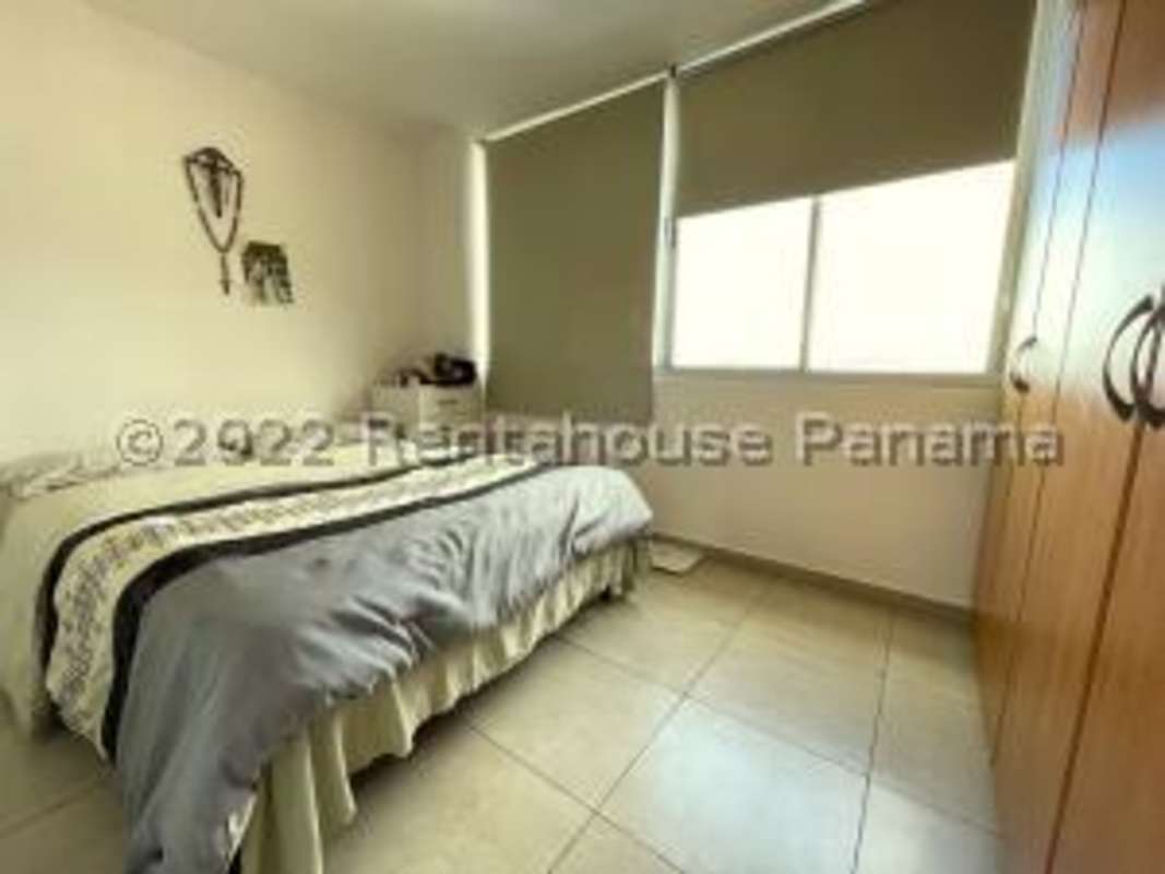 Functional kitchen with granite countertops and modern appliances in Bella Vista Panama