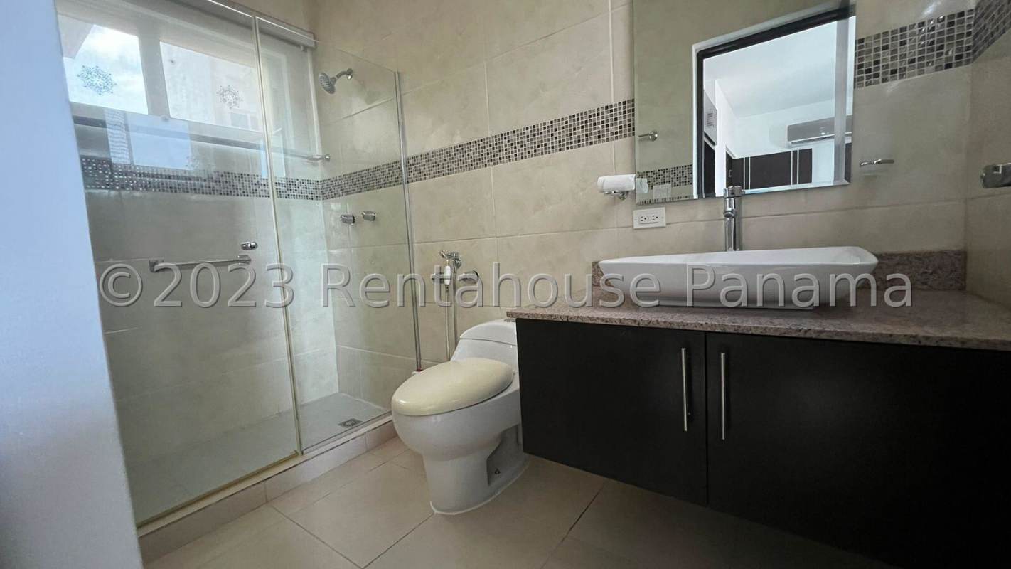 Bright living and dining area with large window, tile floor, roller blinds and balcony access in PH Vista Hermosa Panama City