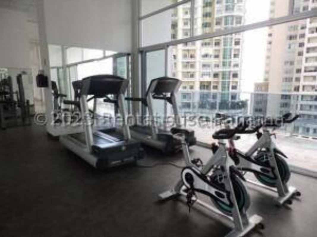 Fully equipped gym overlooking ocean in PH Oasis on the Bay Punta Pacifica Panama