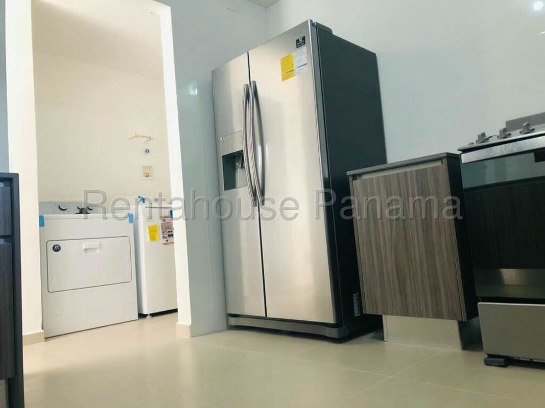 Modern kitchen with wooden cabinets and appliances Golf Gardens PH Brisas del Golf Panama