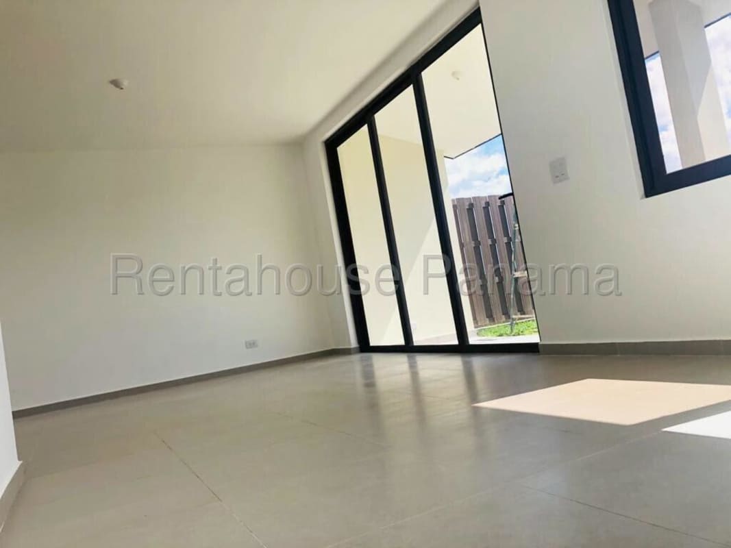 Living area with sliding doors opening to yard Golf Gardens PH Brisas del Golf Panama City