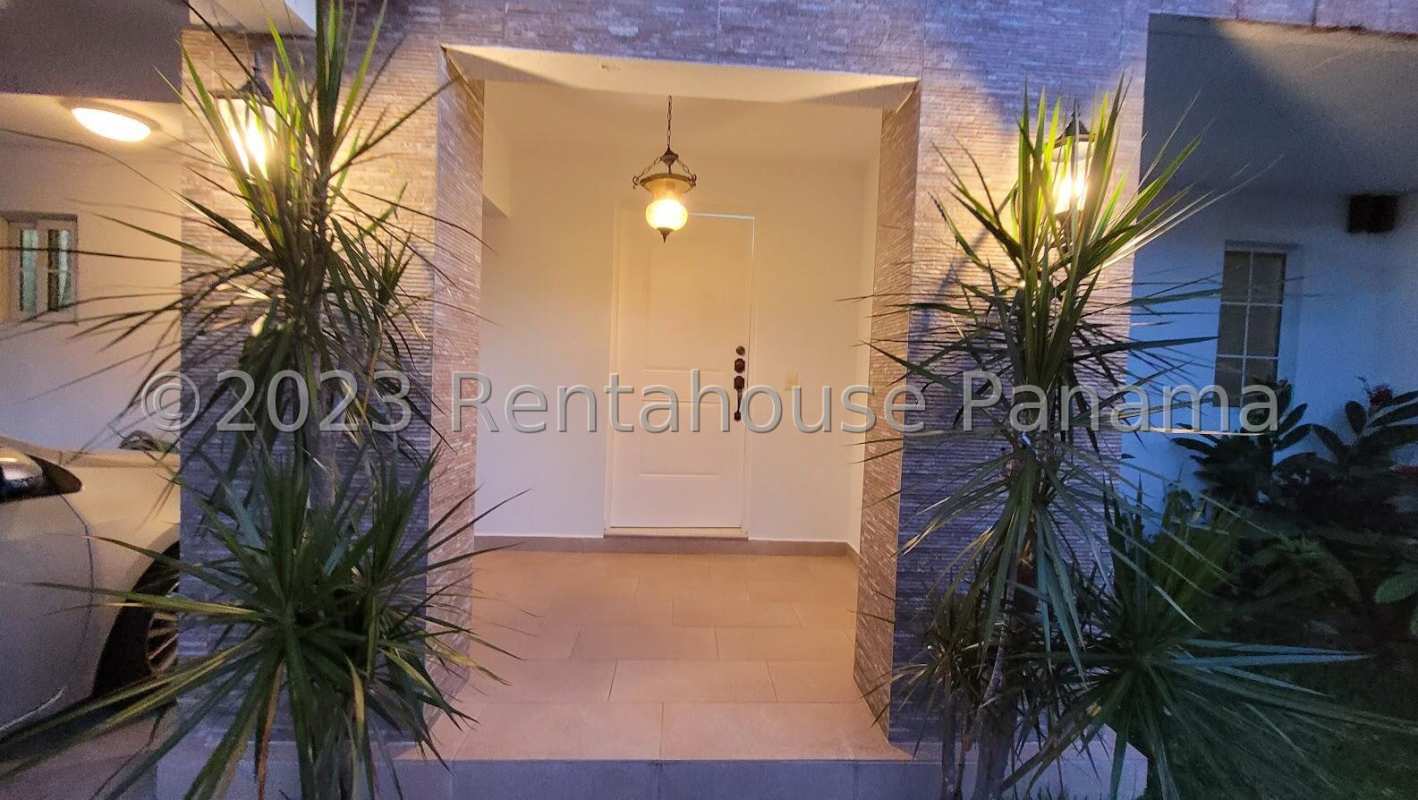 Mediterranean style two-story house with balcony, garden and carport in Quintas de Versalles Panama City