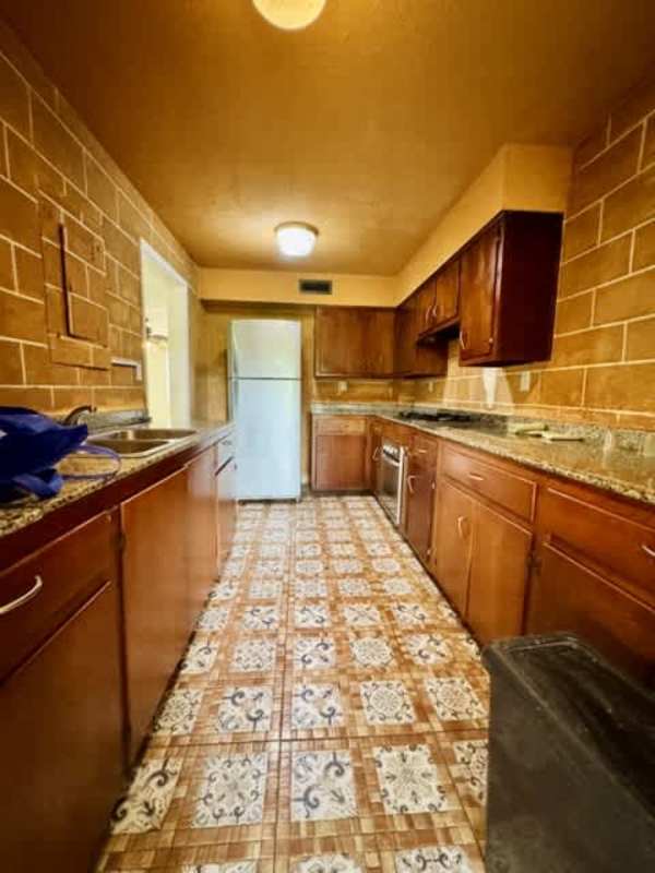 Remodeled bathroom with walk-in shower, modern tile and vanity in Clayton for rent