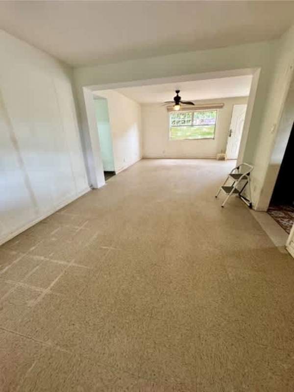 Bedroom with wooden style flooring, AC split unit, closets at Clayton rental apartment