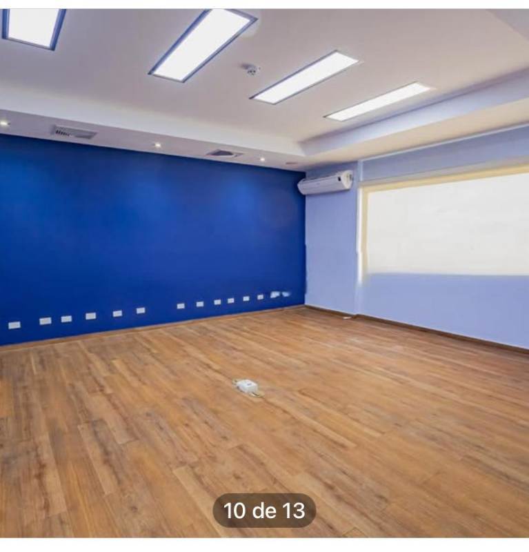 Office space with glass partitions adjacent to secure corridor Panama Costa del Este