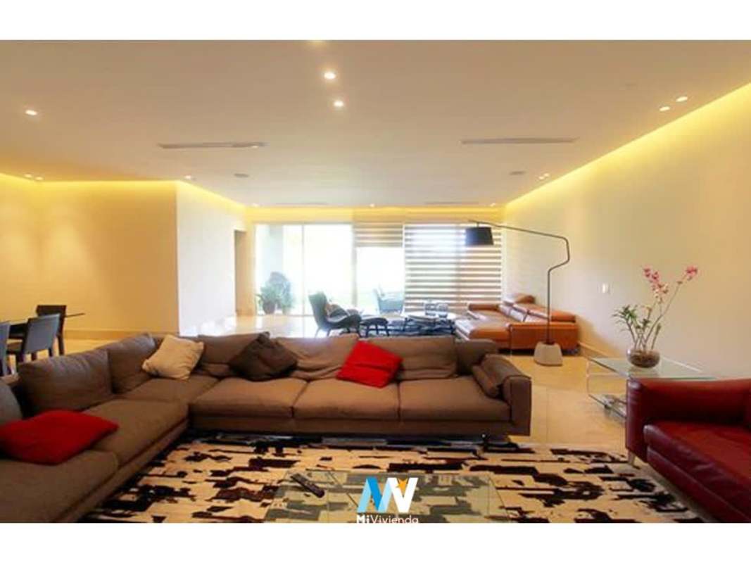 Spacious German-style kitchen with island and marble finishes in The Reserve Santa Maria Panama apartment