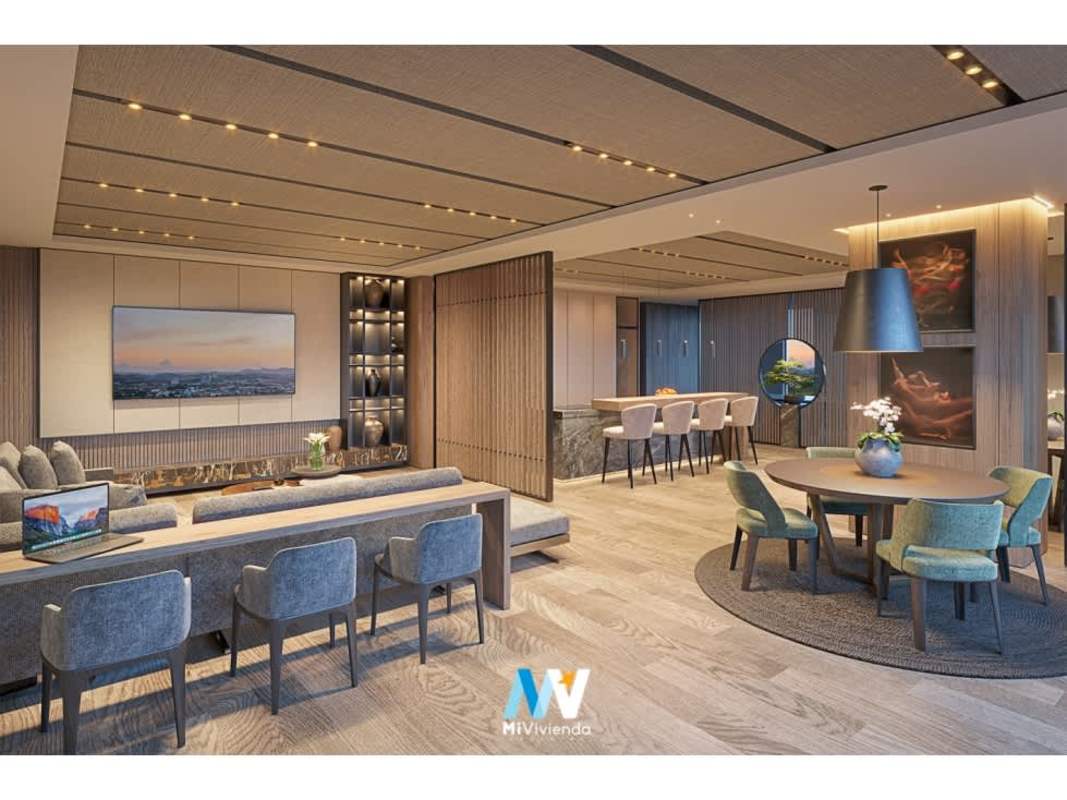 Modern lobby area with high ceilings, wood accents, marble reception PH Corotú luxury Panama City