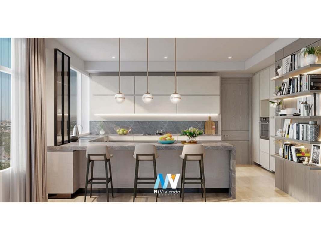 Open kitchen with marble island, pendant lighting and city views PH Celeste