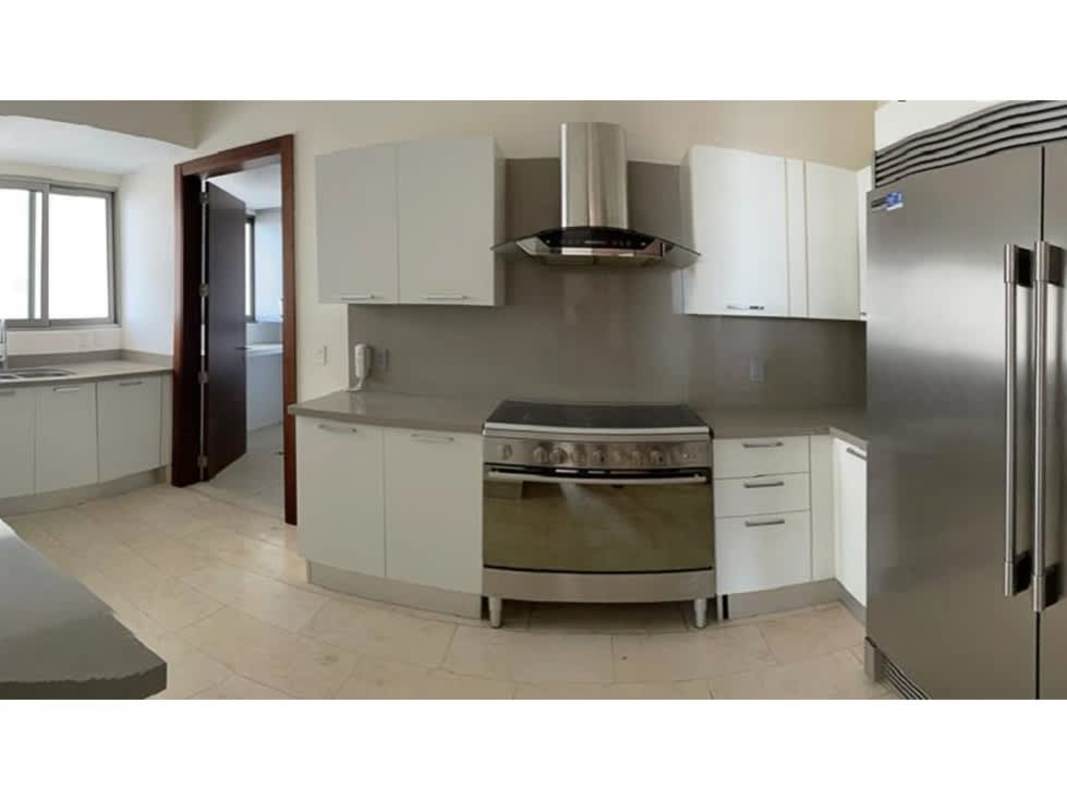 Fully-equipped kitchen with stainless steel appliances at Greenview Residences Santa María Panama