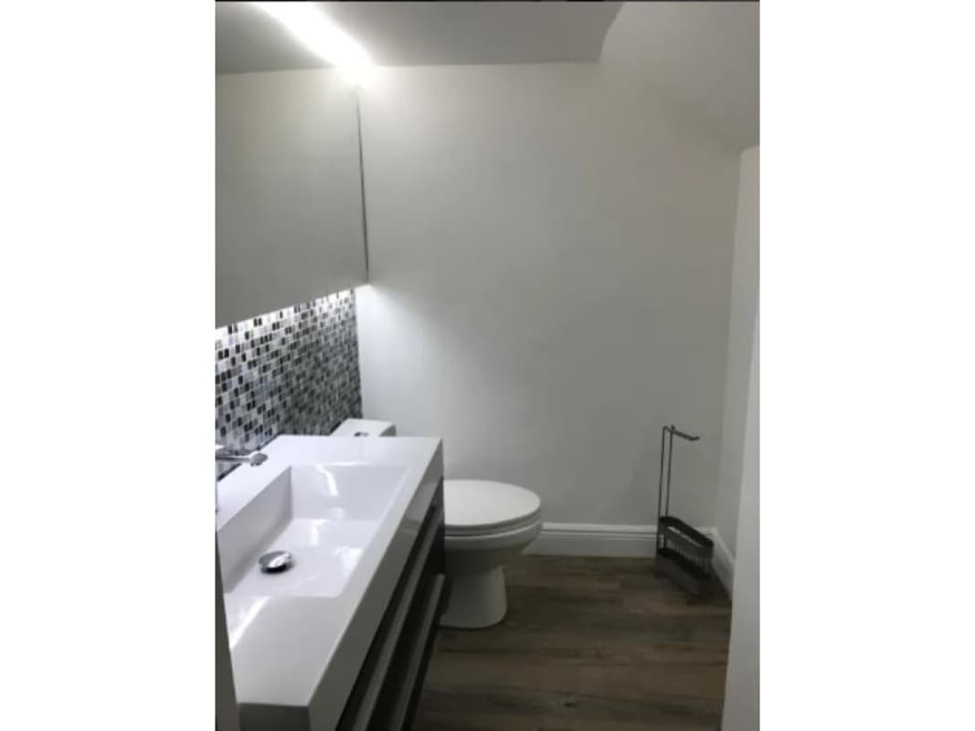 Bright living room of Lyon Model Versalles I home with ceramic floors and access to garden