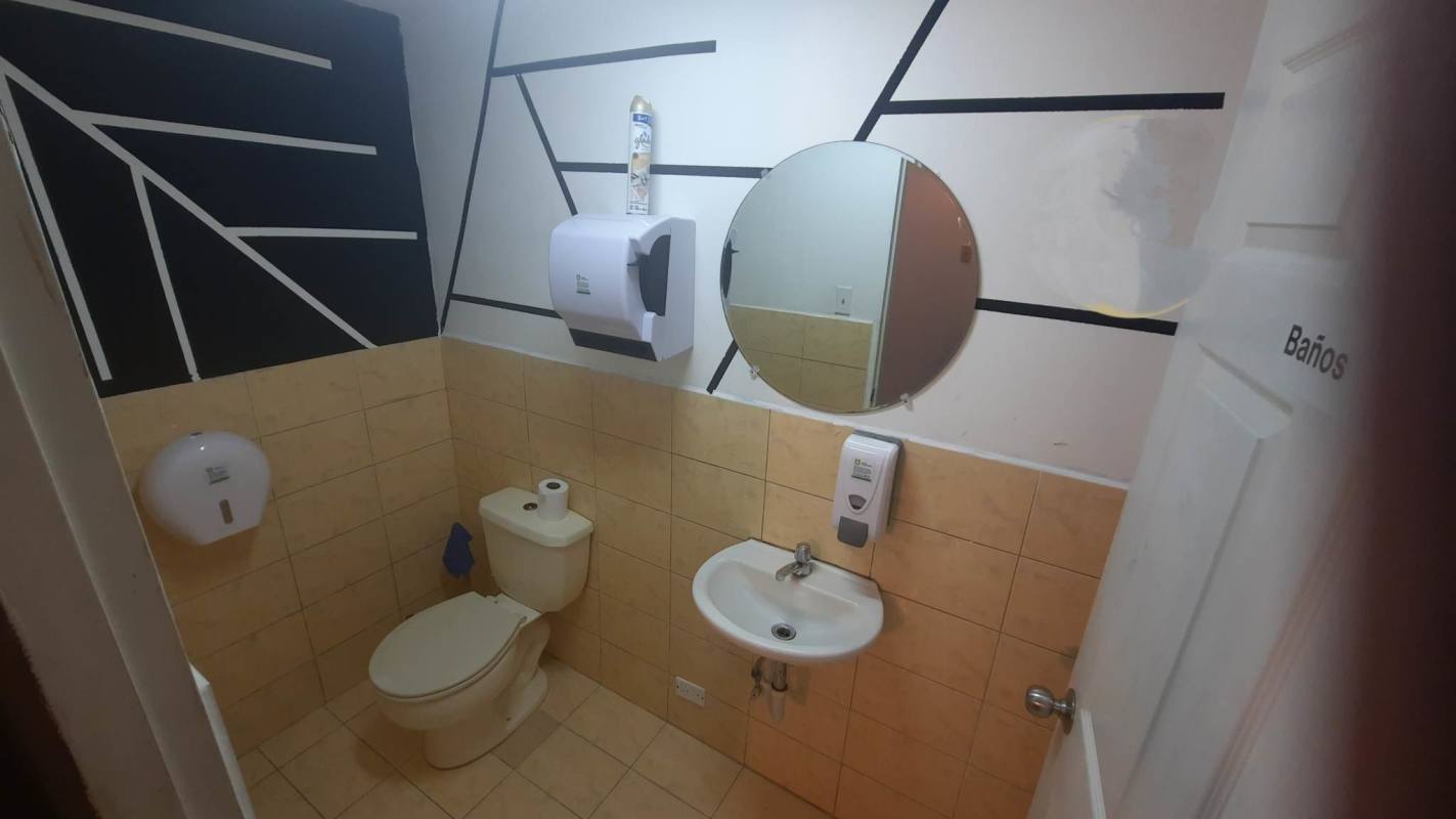 Kitchenette with cabinets sink tile backsplash studio rental Panama