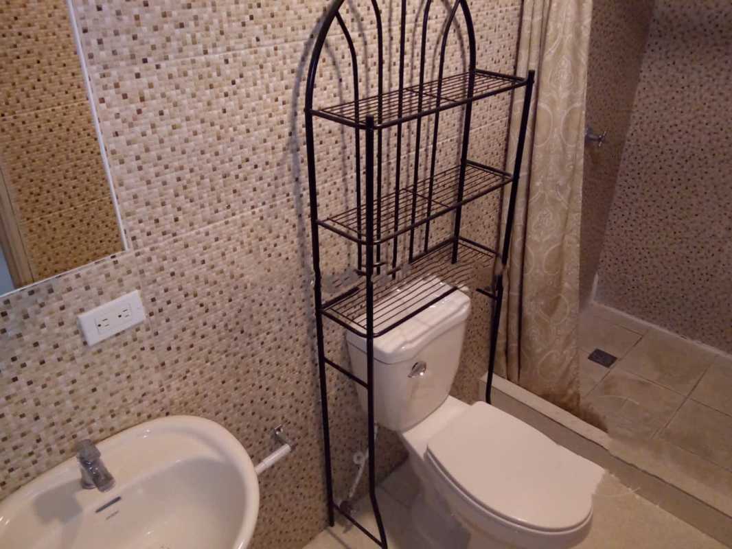 Commercial space interior tiled floor window Via Israel Panama