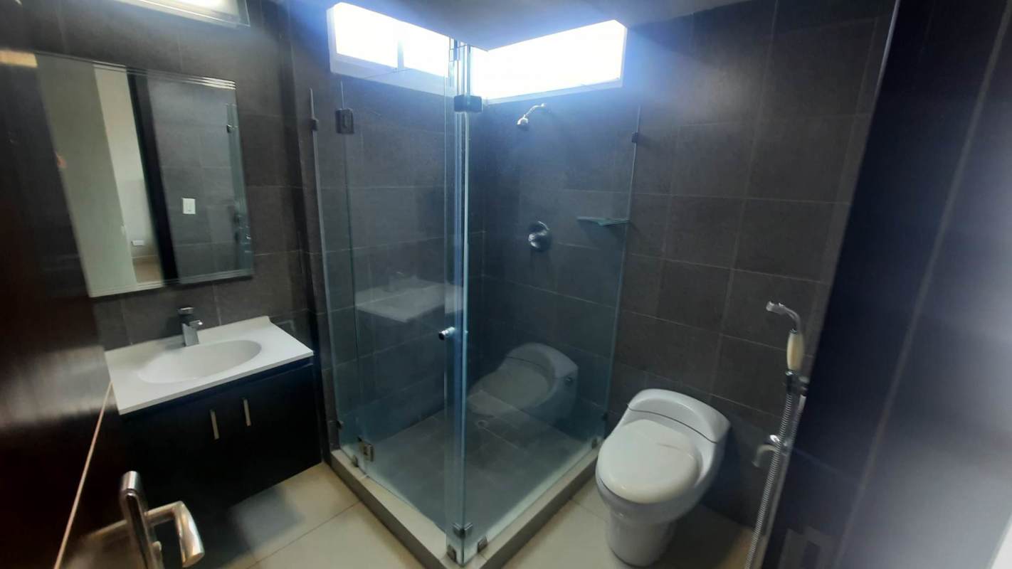 Modern bathroom with shower glass enclosure wall tiles Costa del Este apartment Panama
