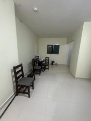 Bright living and dining space with ceramic tile in new Las Brisas de David home Panama