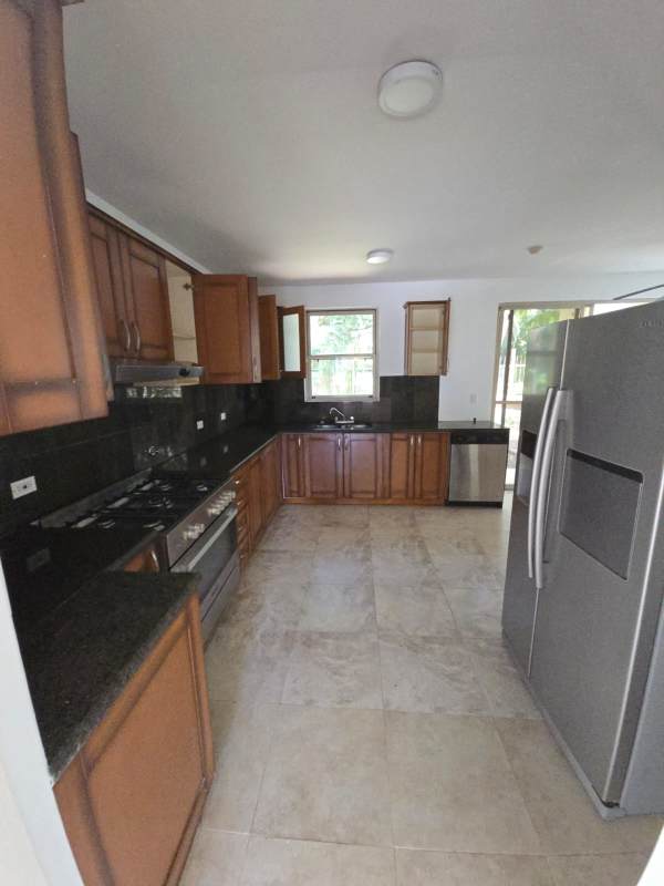 Covered outdoor terrace overlooking lush gardens Embassy Gardens Clayton