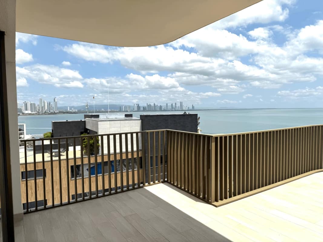 Bright open living space with marble floor, balcony access and ocean view Seascape Ocean Reef Panama