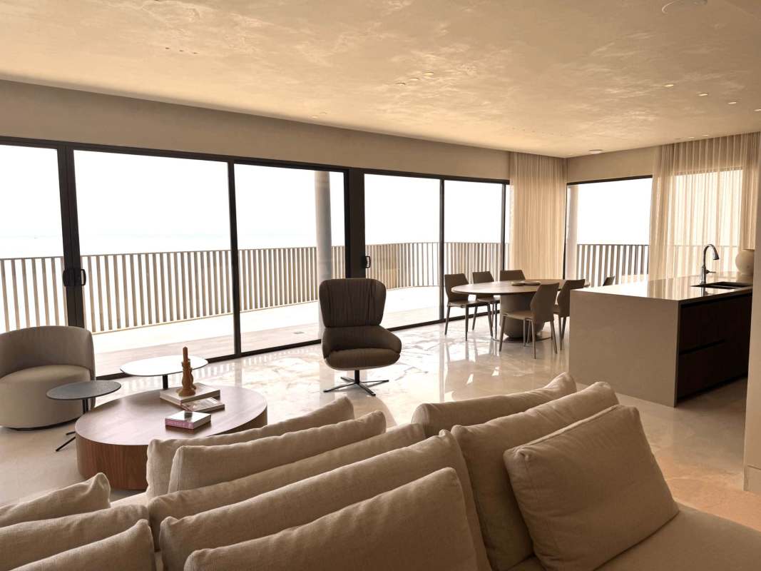 Contemporary kitchen with marble countertops, ocean view at Seascape Ocean Reef penthouse