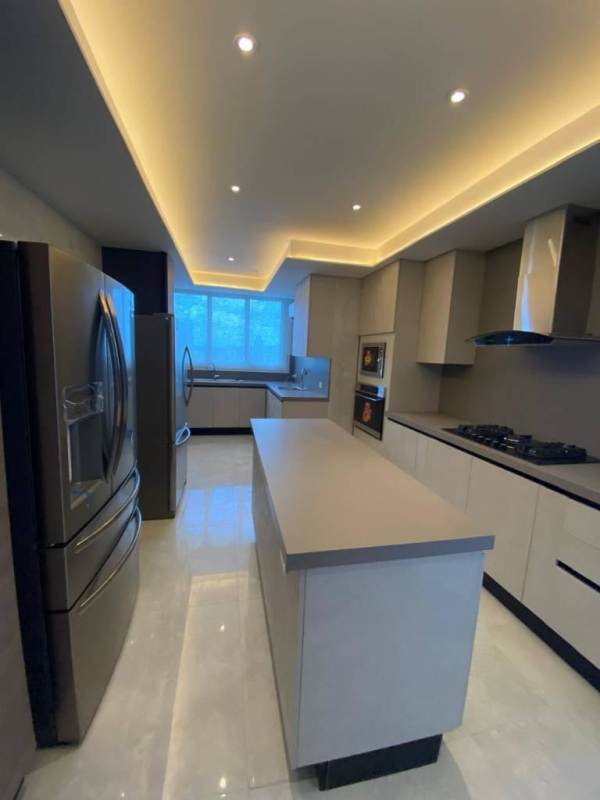 Modern entry lobby with concierge in PH Ocean Front Punta Paitilla Panama City