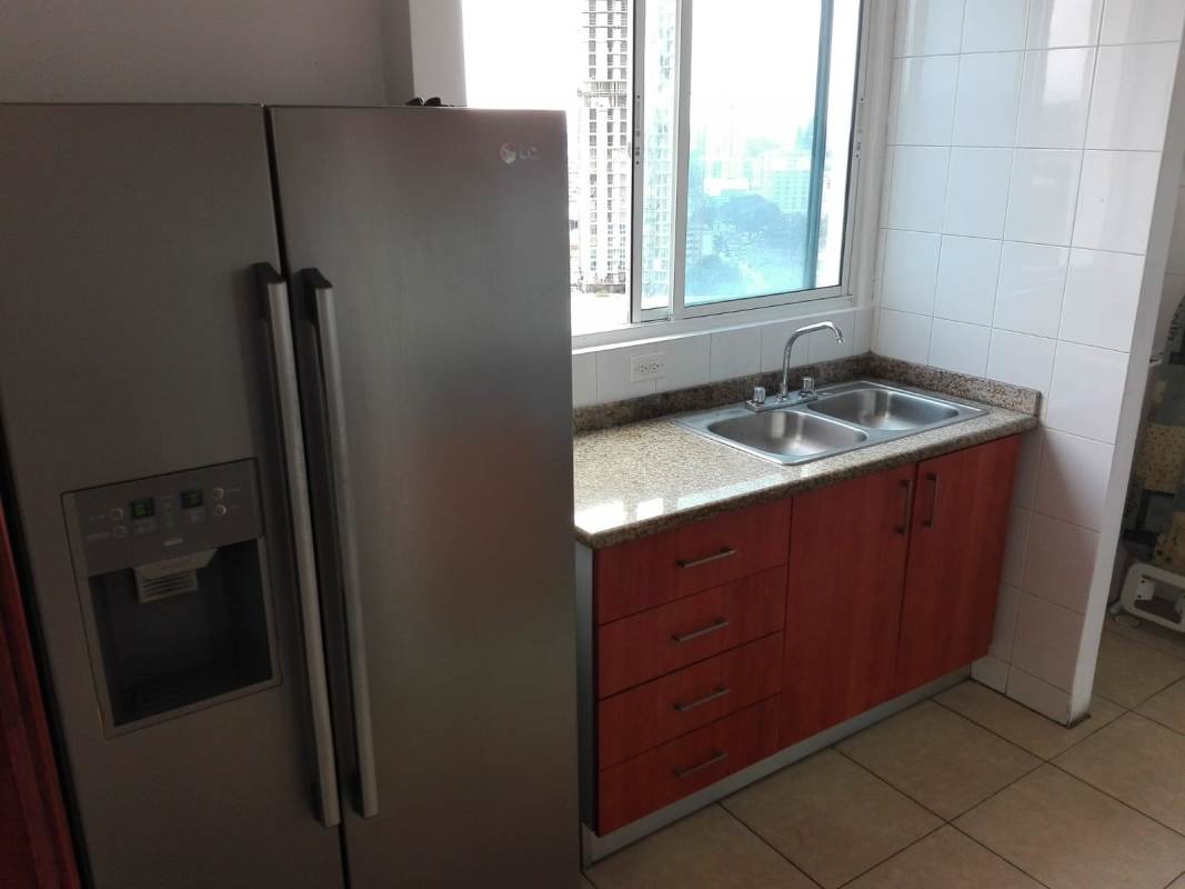 Kitchen with granite counters, stainless sink, window view at PH La Loma Hato Pintado apartment rental