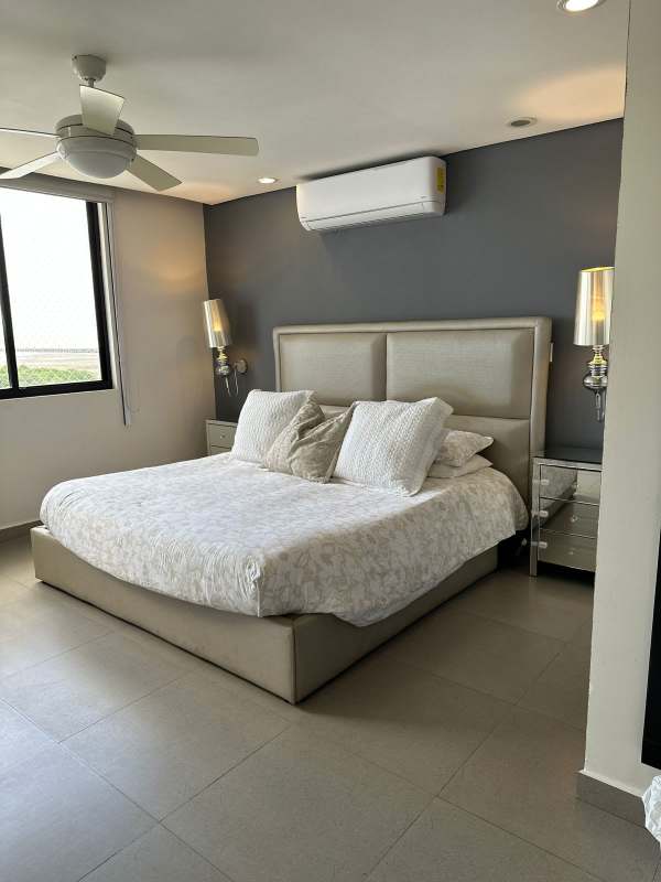 Open plan living and dining area with large oceanview windows PH Luna del Mar Coco del Mar Panama