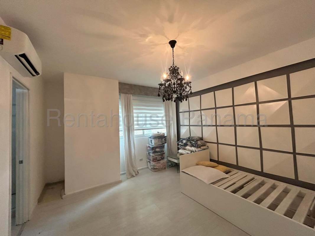 Large master bedroom with ocean views, en-suite bath walk-in closet in PH Paitilla Tower Panama City