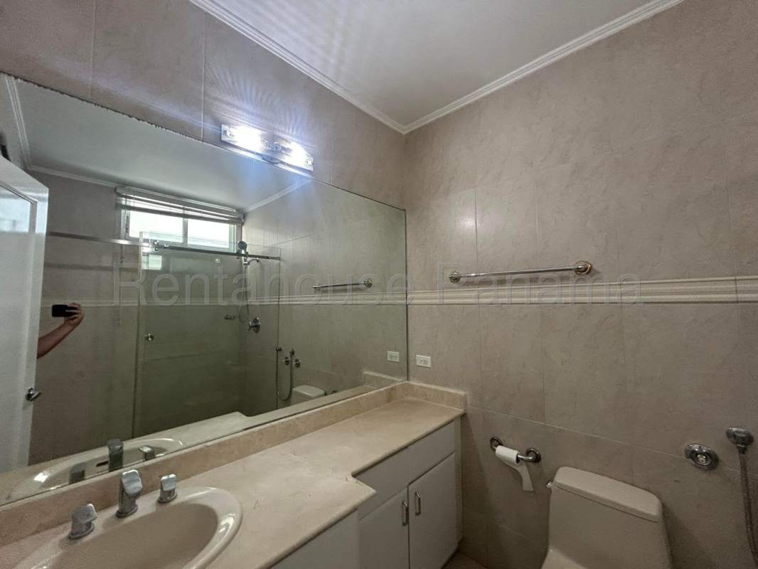 Spacious kitchen with granite countertops, wood cabinets, modern appliances in PH Paitilla Tower Punta Paitilla Panama