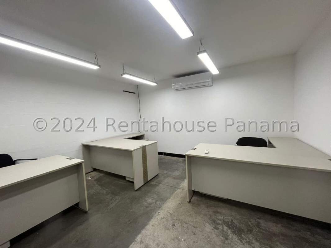 Loading zone view inside industrial warehouse Tocumen with open access and concrete driveway