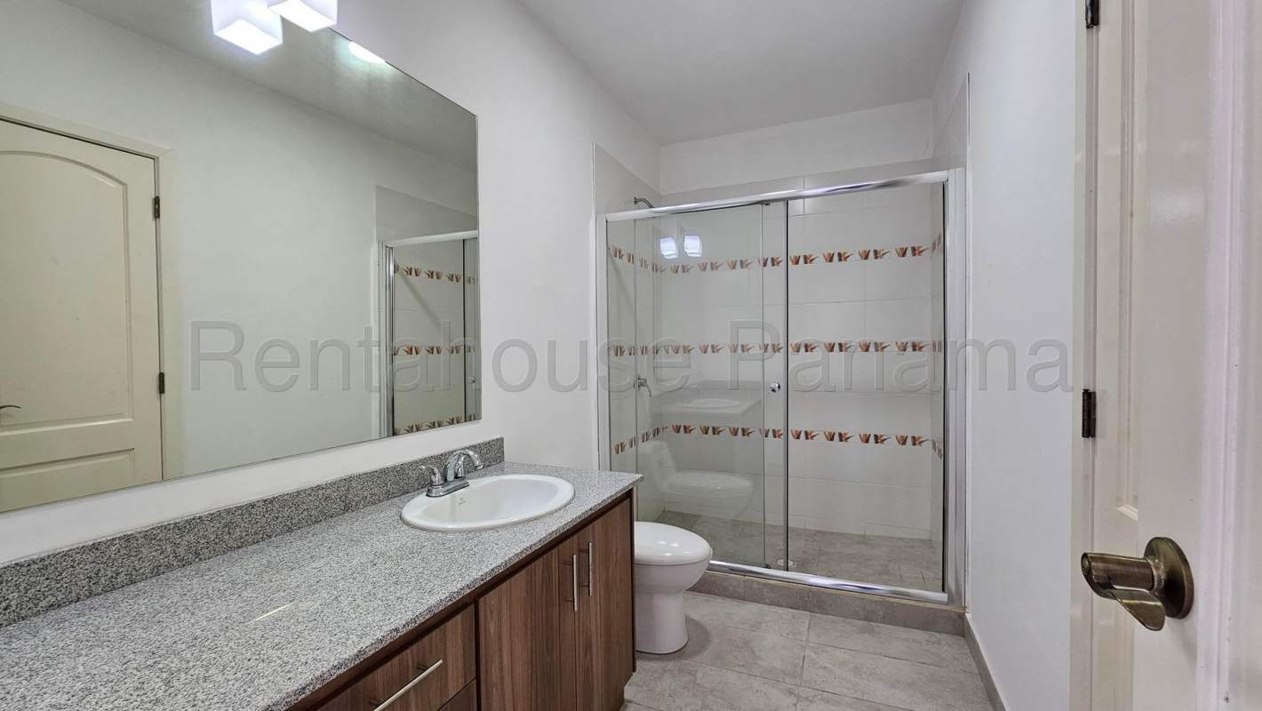 Kitchen with center island granite countertops and large windows at PH Vista del Cangrejo El Cangrejo Panama