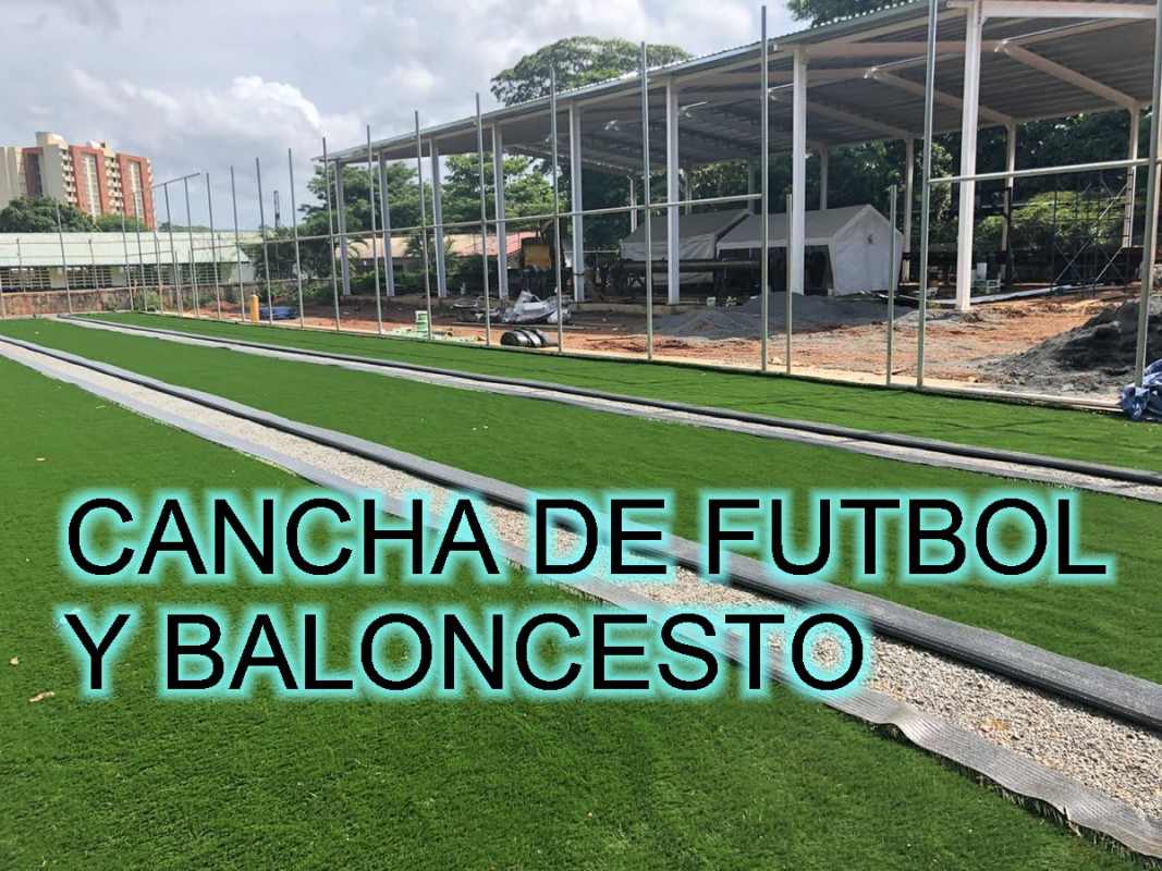 Outdoor soccer and basketball courts under construction in Don Bosco Panama City