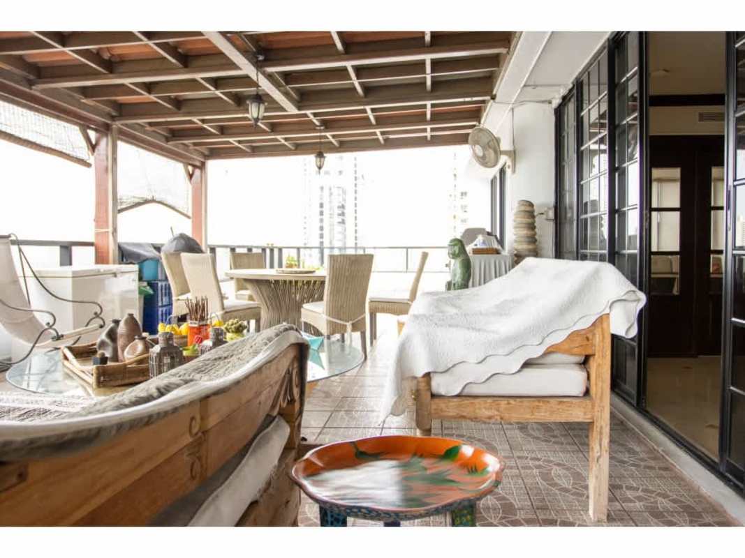 Elegant living room with marble floors and city skyline views PH Condesa del Mar Panama