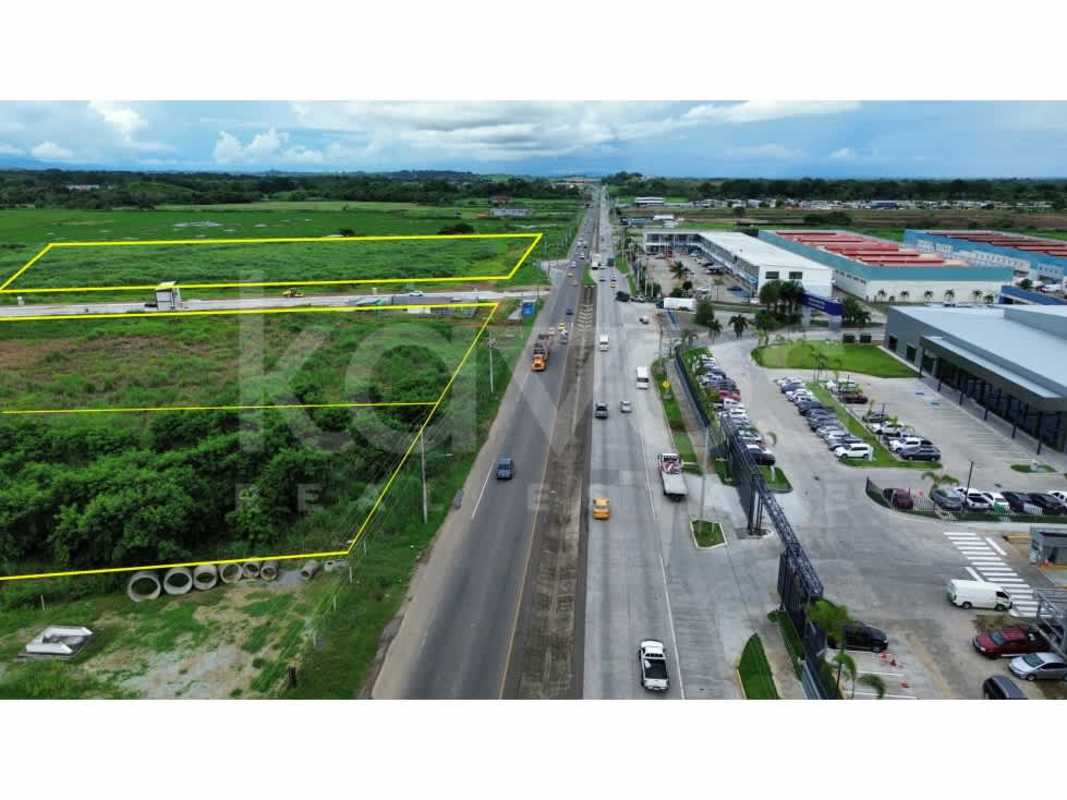 Aerial panorama of industrial buildings and vacant land next to Via Interamericana Tocumen Panama