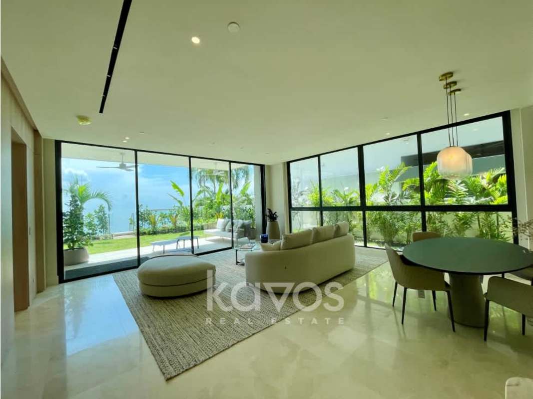 Modern kitchen with quartz counters and island in luxury waterfront condo at Ocean Reef Island Panama