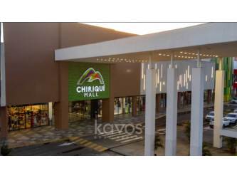 Front facade of Chiriquí Mall entrance vertical lights modern architecture David Panama