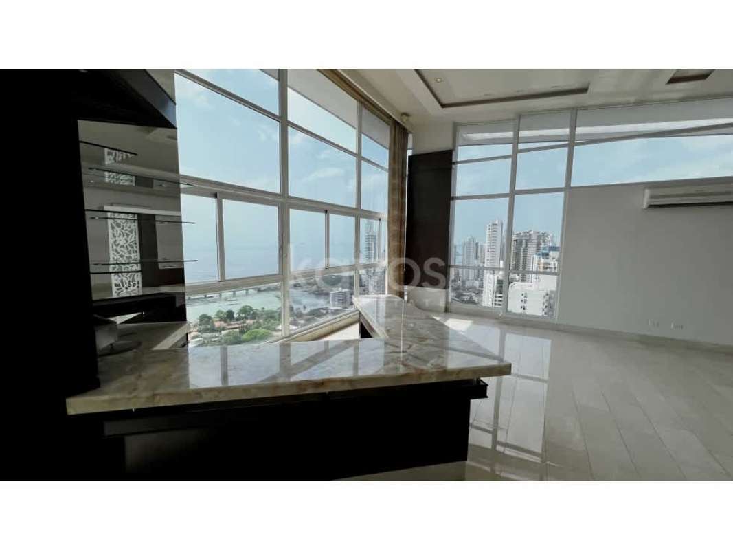 Spacious living and dining with floor-to-ceiling windows and ocean views in PH Punta Arena Coco del Mar