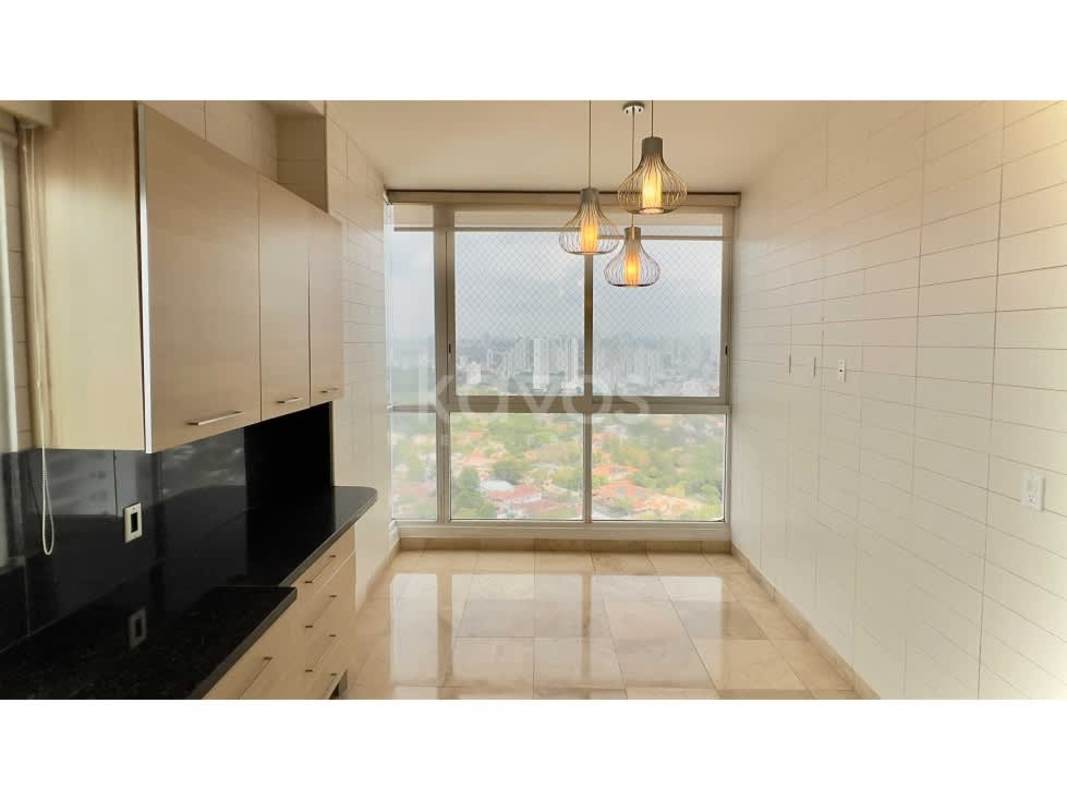 Spacious marble bathroom with double sinks and glass shower PH Punta Arena Panama