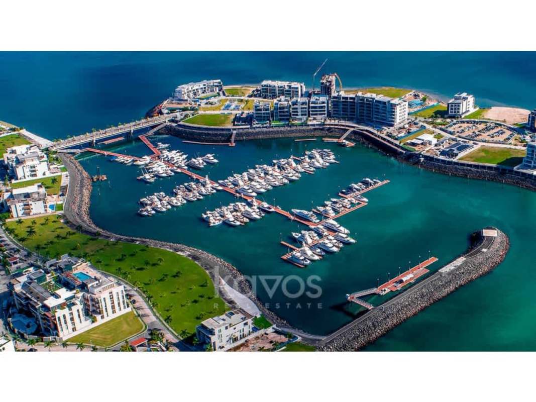 Night view of Ocean Reef Islands private marina with yachts and Panama skyline