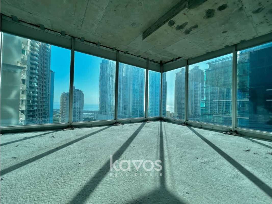 Corner commercial shell office with glass walls and skyline view in Oceania Business Plaza Punta Pacifica Panama