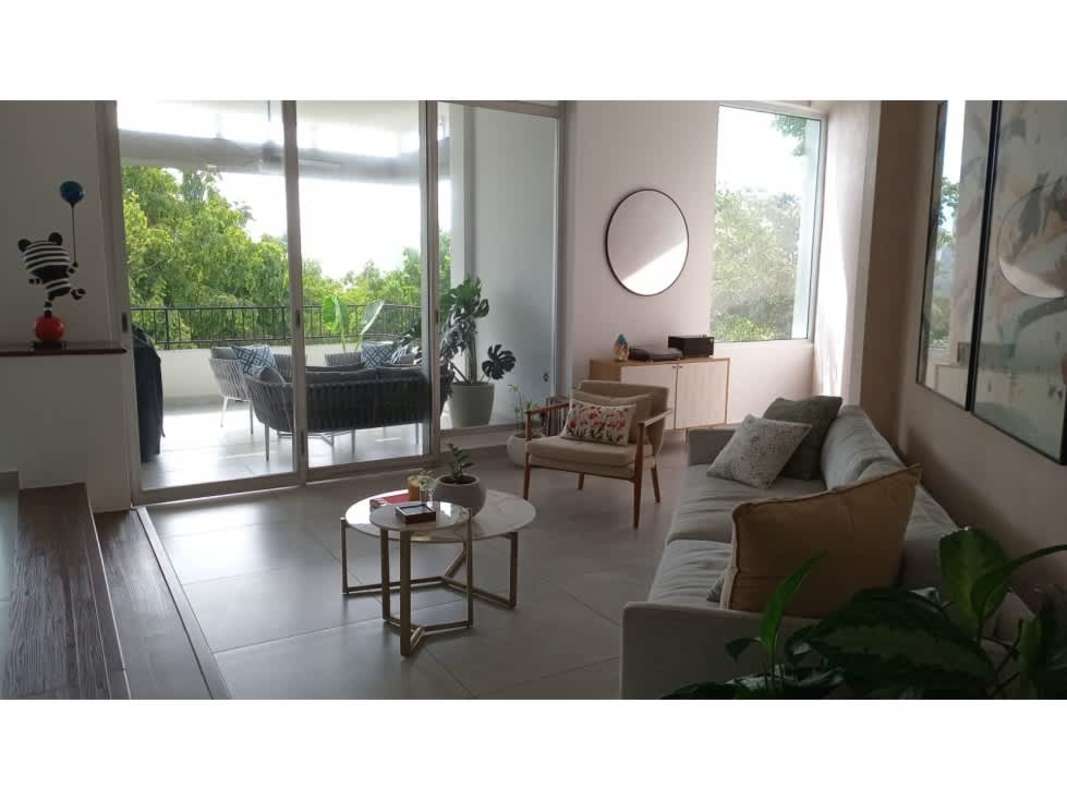 Dining and kitchen area with large windows, natural light in 3-story house Panama City Hato Pintado
