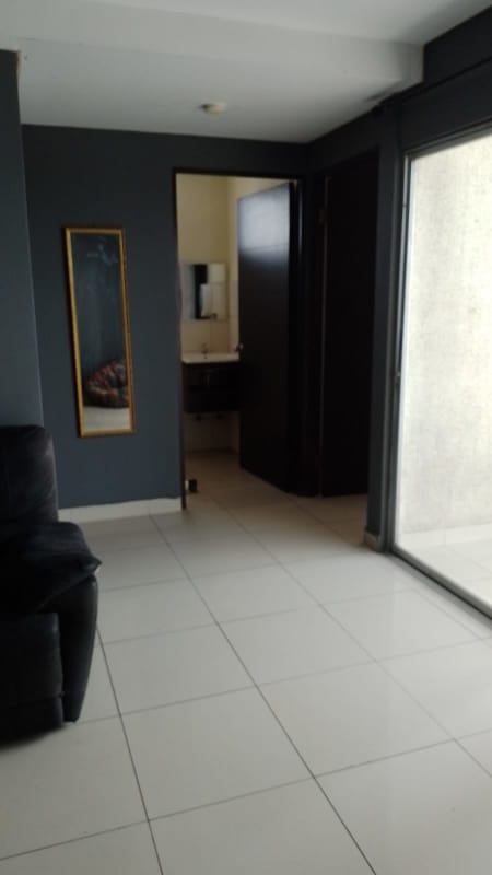 Bedroom interior with closet, tiled flooring in PH Centennial Parque Lefevre Panama