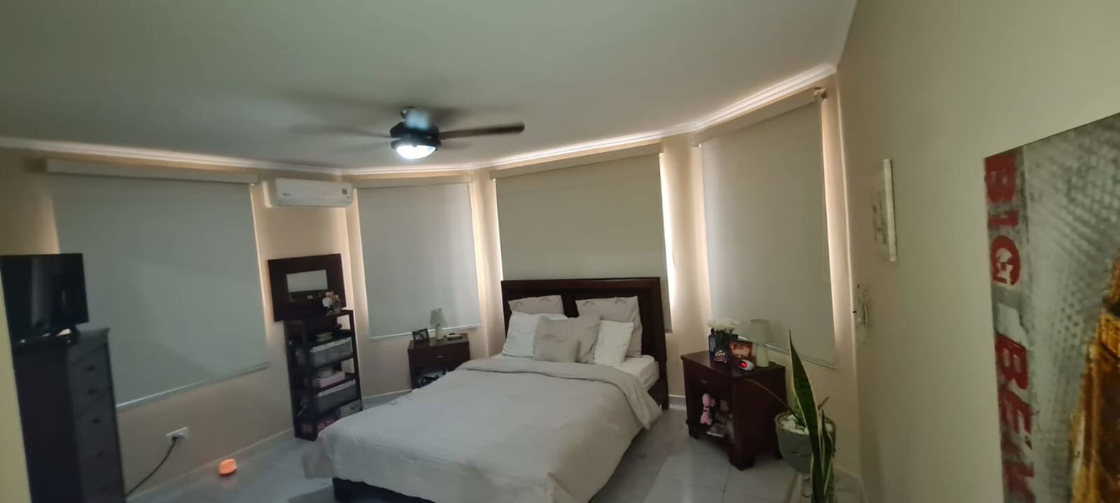 Contemporary living room with TV area, stone accent wall, access to garden in Green Valley Albrook