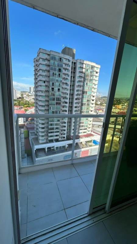 Covered terrace balcony with urban skyline view PH Metropolitan Park apartment rental Panama City