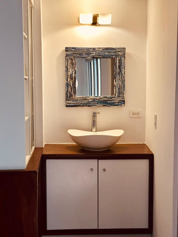 Bedroom with closet, air conditioning, hardwood flooring in PH Jerónimo Casco Viejo Panama apartment for rent