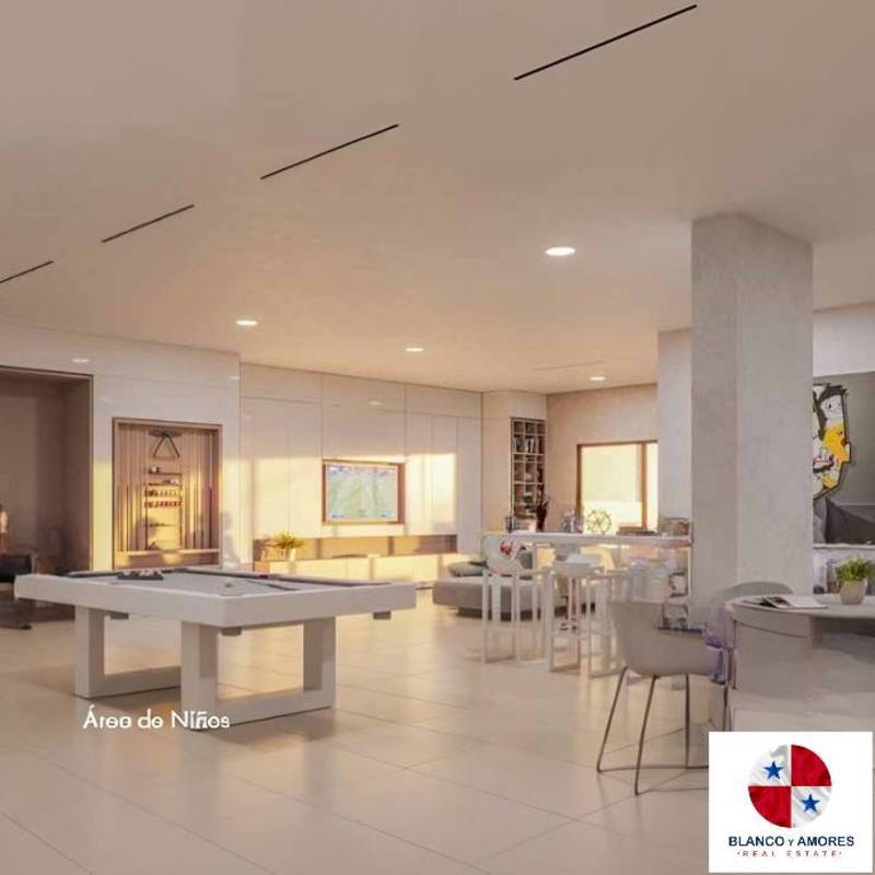 Sleek modern condominium tower with balconies palm trees and driveway on Ocean Reef Island Panama