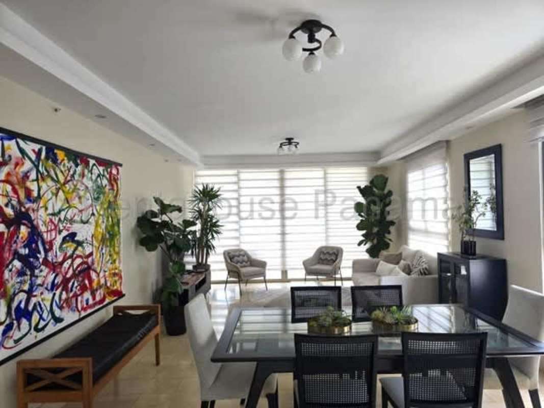 Stylish furnished living room with marble floors and natural light in Santa Maria Panama