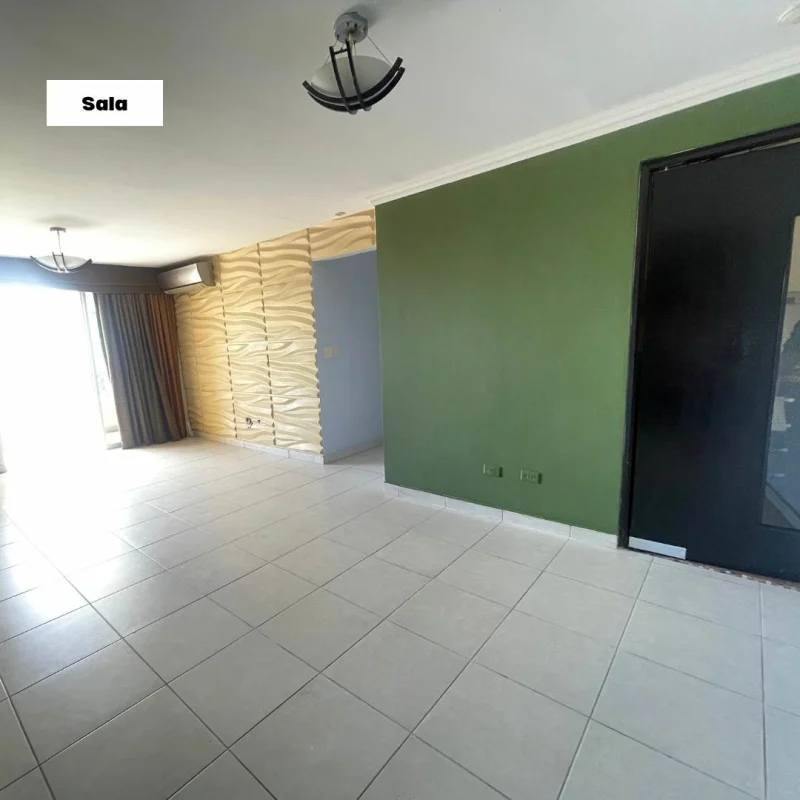 Bedroom with built-in closet, split AC, ceiling fan and window PH Torre Porras Via Porras Panama City