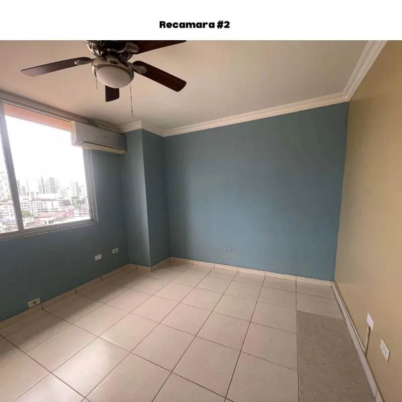 Master bathroom with vanity, pink shower curtain, granite top, tiled walls in PH Torre Porras Via Porras